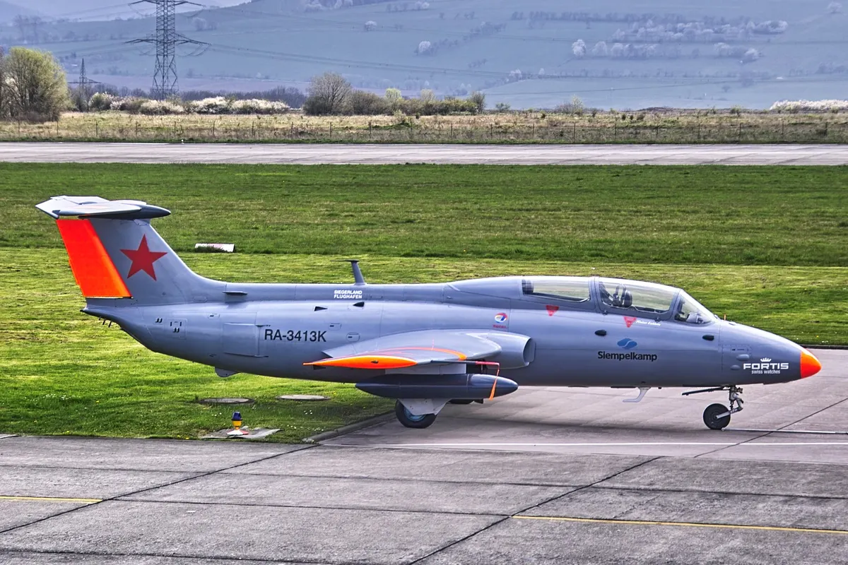 Civilian-registered L-29 Delfin jet trainer painted in warbird livery