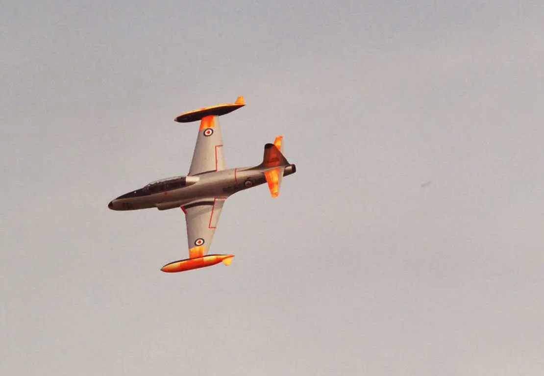 Row of Canadair CT-133 Silver Star jet trainers on an airfield