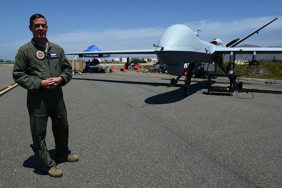 US military personnel testing counter-drone equipment during a field exercise