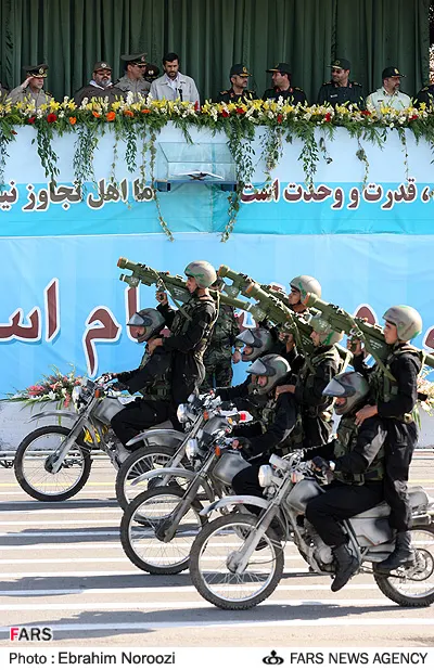 Iranian military parade with missile launchers