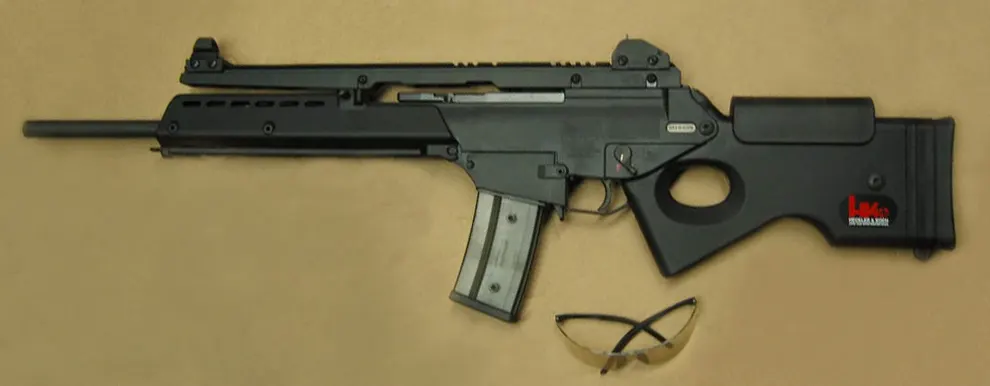 The Heckler & Koch SL8, a semi-automatic civilian rifle built on an assault rifle's polymer receiver and gas-piston action, with its stock reworked to satisfy the checklist written into America's 1994 assault weapons ban