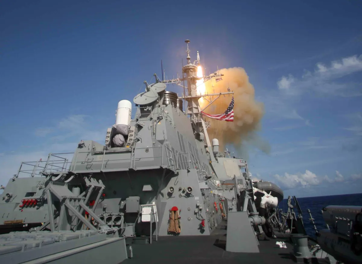 US Navy destroyer launching a Standard Missile interceptor at sea
