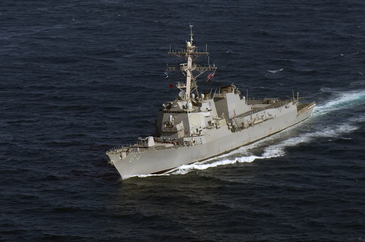 Multiple Arleigh Burke-class destroyers in formation at sea