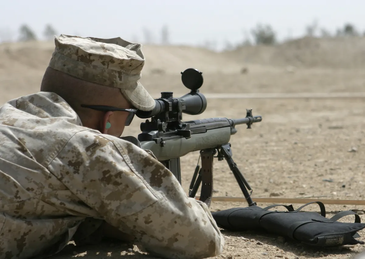 Marine with M14 pattern designated marksman rifle