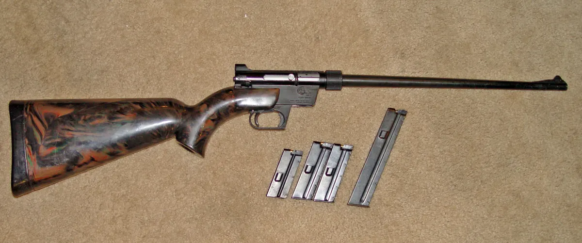 ArmaLite AR-7 survival rifle broken down with parts stored in its stock