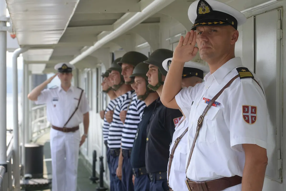 Ceremonial honor guard soldiers on parade with rifles